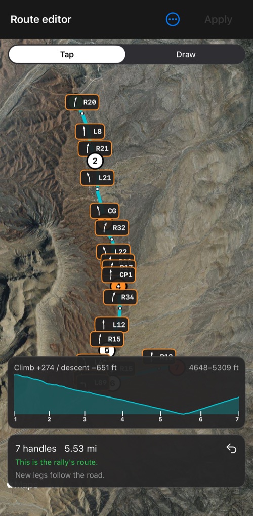 The route editor with an applied route: numbered handles, the road followed between them, course notes with their tulip diagrams on the route, the terrain profile and the status card