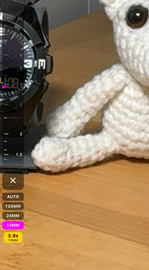 A faixa com a lente de 13MM escolhida e o zoom em 3.8x, além da linha tracejada onde as marcas ficam apagadas