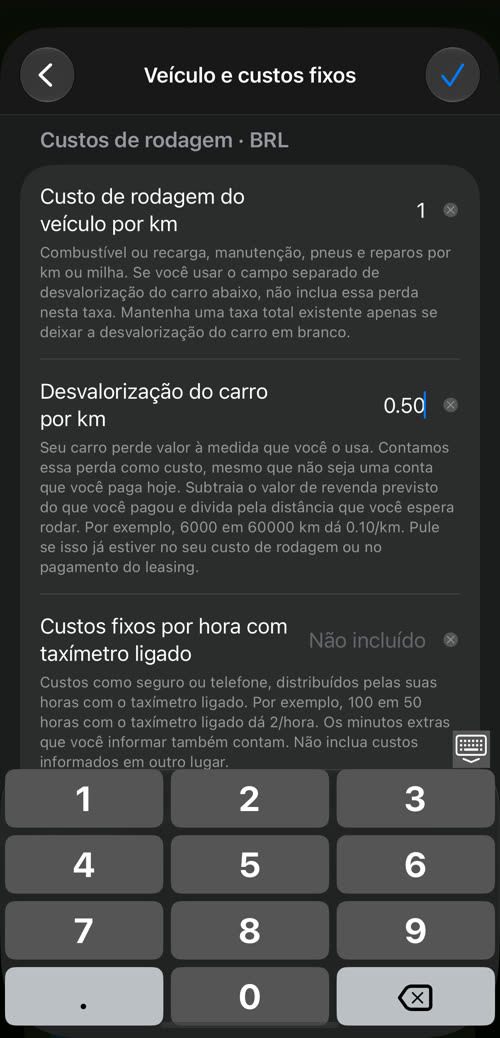 Digitando 1 no custo de rodagem do veículo e 0.50 na desvalorização do carro, no teclado do app